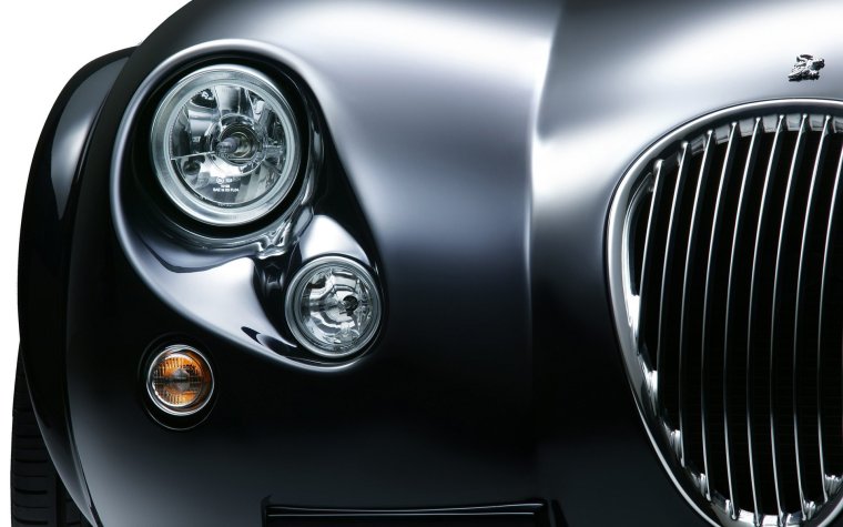 Машины с круглыми фарами спереди