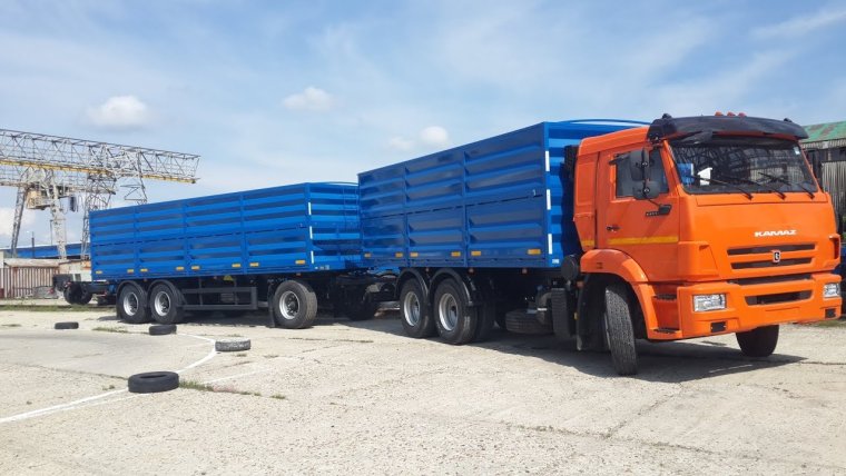 КАМАЗ 65115 зерновоз с прицепом новый