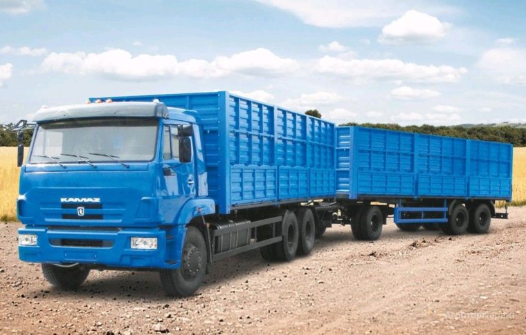 КАМАЗ 65117 зерновоз с прицепом бортовой