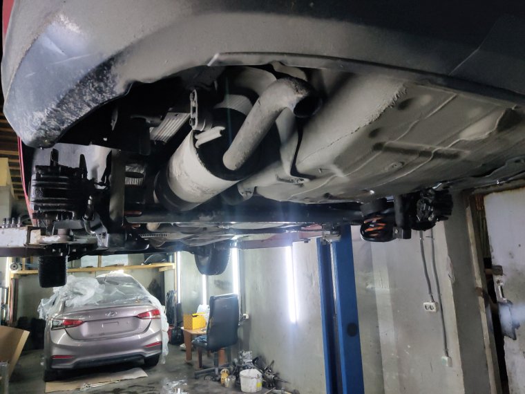 Защита Шкода Рапид у глушителя