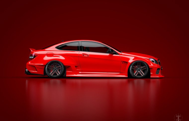 Красный автомобиль сбоку