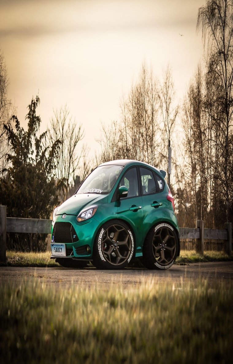 Электромобиль Тойота трехколесный