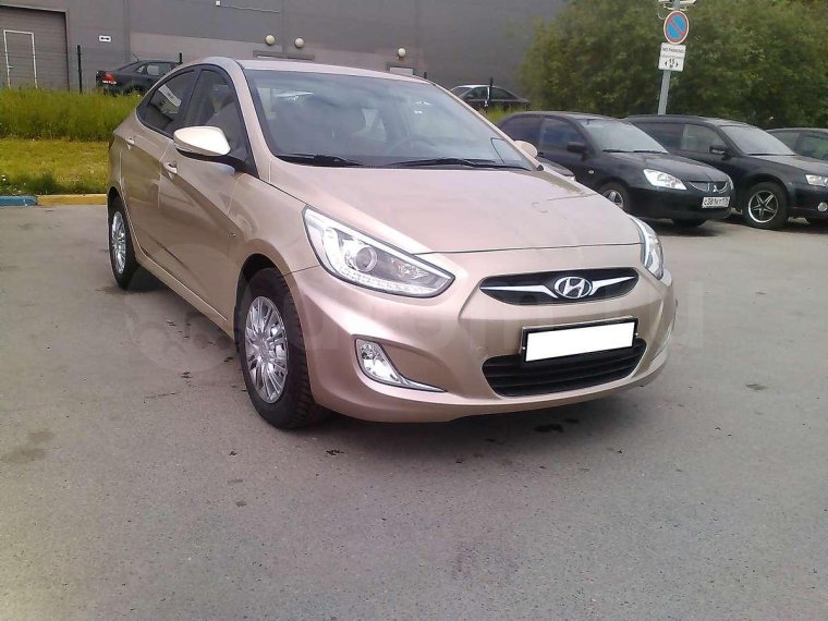 Hyundai Solaris бежевый металлик