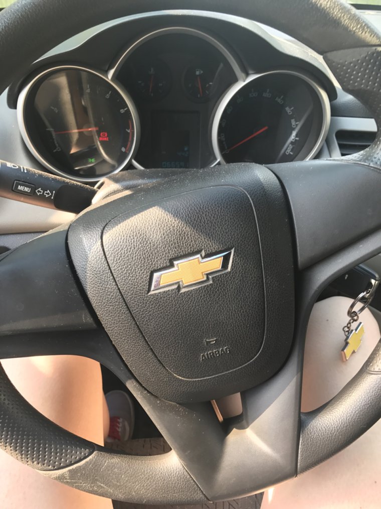 За Шевроле Круз за рулем