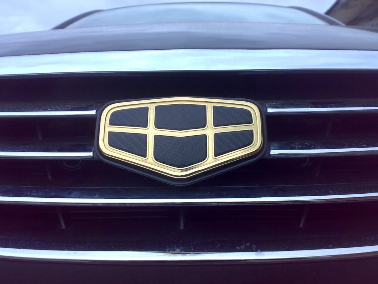 Марка машины Geely значок