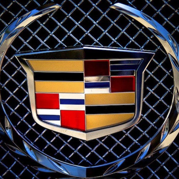 Cadillac Escalade значок