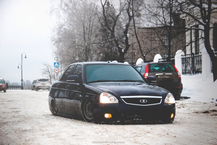 Лада Приора седан посаженая