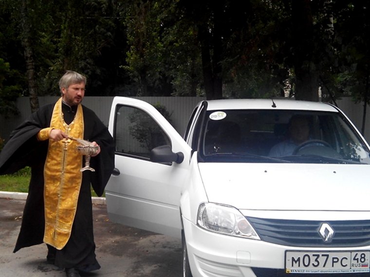 Освятить автомобиль