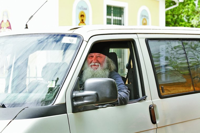 Машины священников