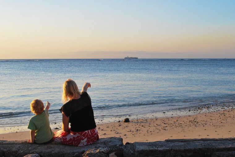 A girl with her Family at the Sea
