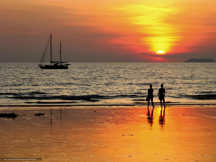 Двое на корабле на закате