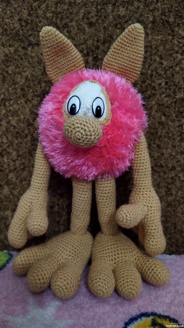 Черный лохматый котенок