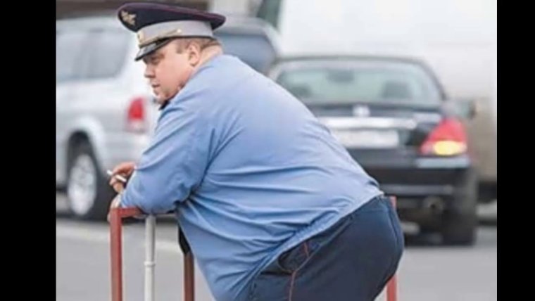 Толстый милиционер