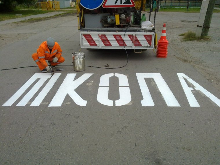 Укладка асфальта в дождь США