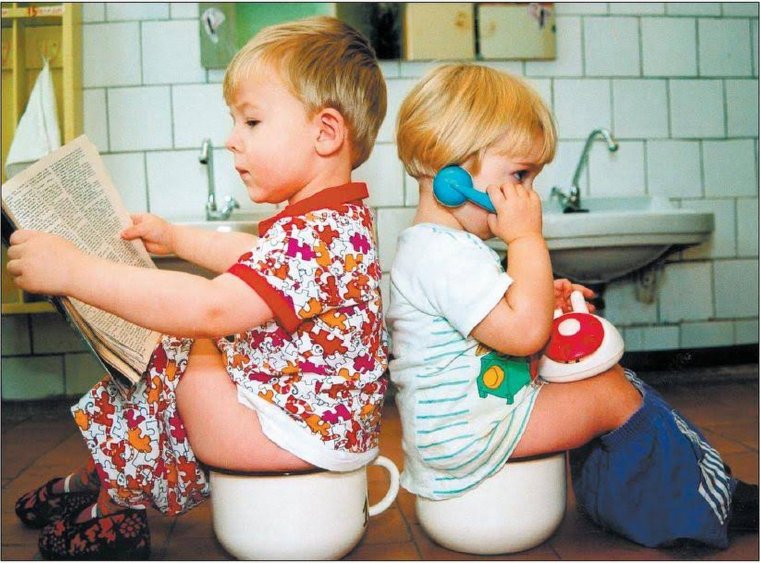 Малыши в садике на горшках