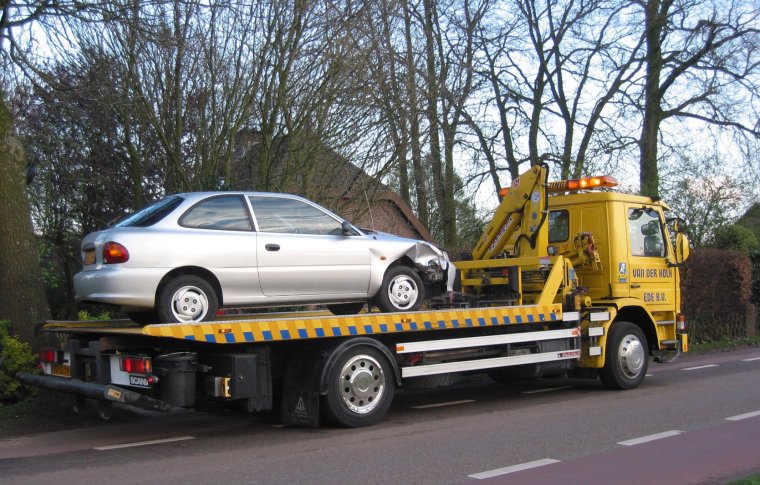 Эвакуатор машины полицейские