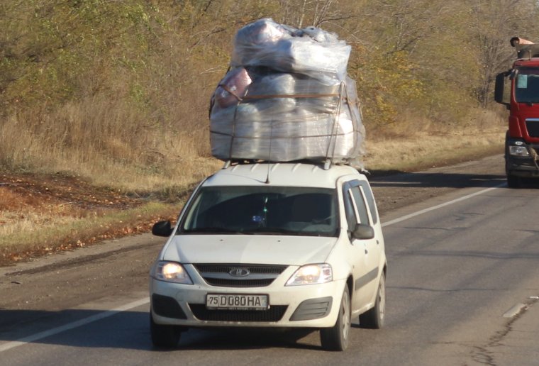 Груженый Ларгус с прицепом