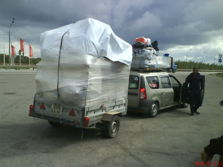 Груженый Ларгус с прицепом