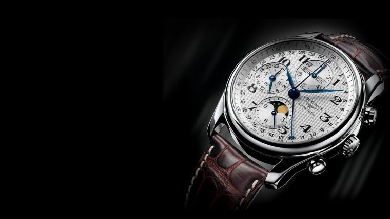 Руль БМВ И рука с часами