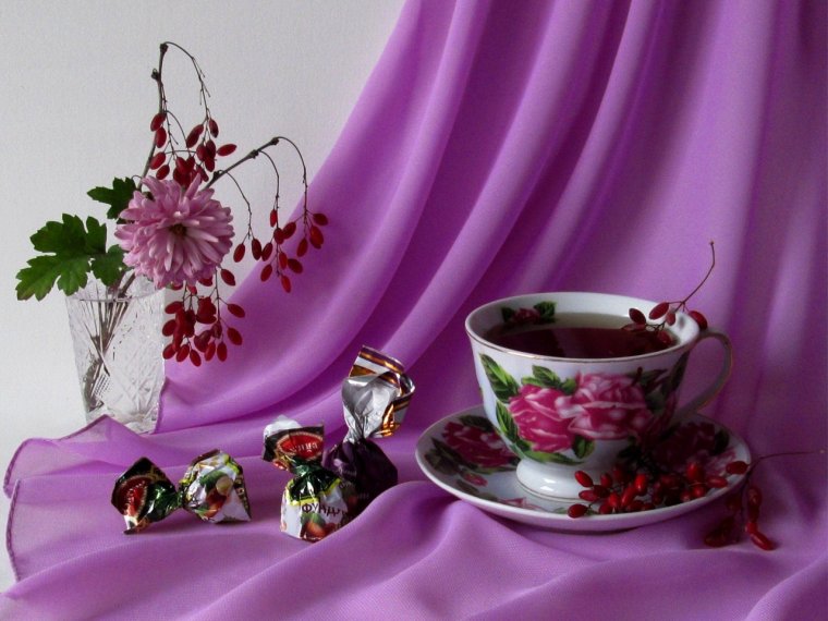 Цветы в чашке