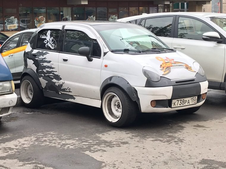 Наклейки на авто симпсоны
