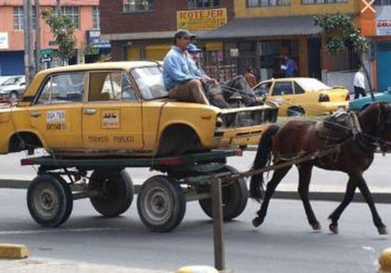 Машина запряженная лошадью