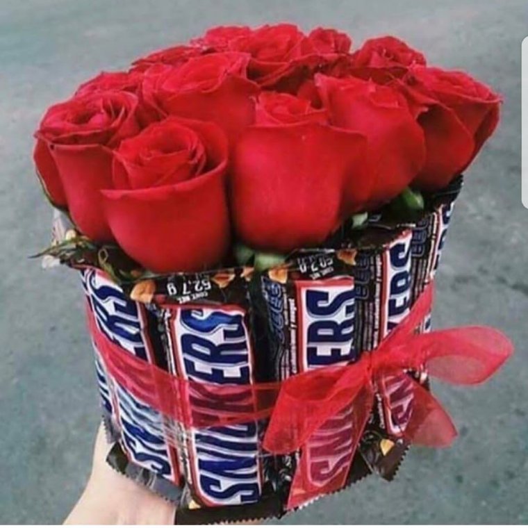 Медвежонок с цветами