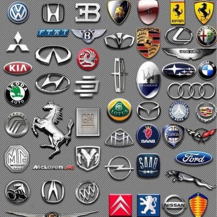 Марки машин значки Траум