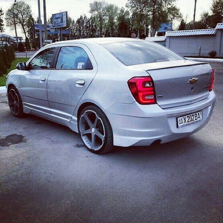 Тюнинговый передний бампер Шевроле кобальт