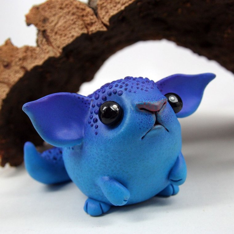 Фигурки из голубой глины