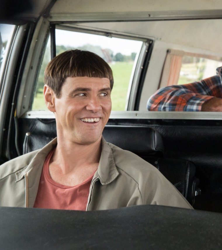 Джим Керри на мопеде