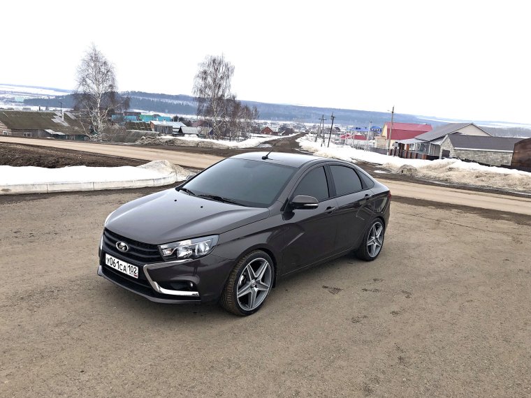 Лада Веста седан черная тонированная