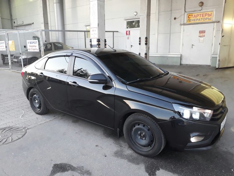 Лада Веста черная тонированная