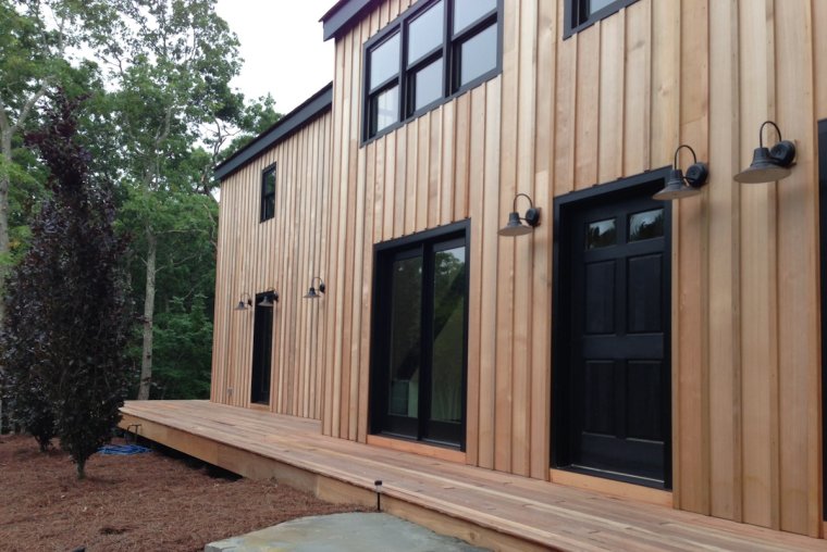 Дом обшитый доской