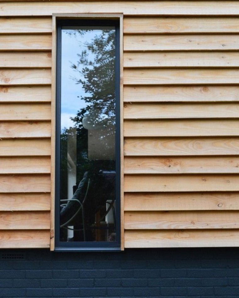 Отделка фасада доской